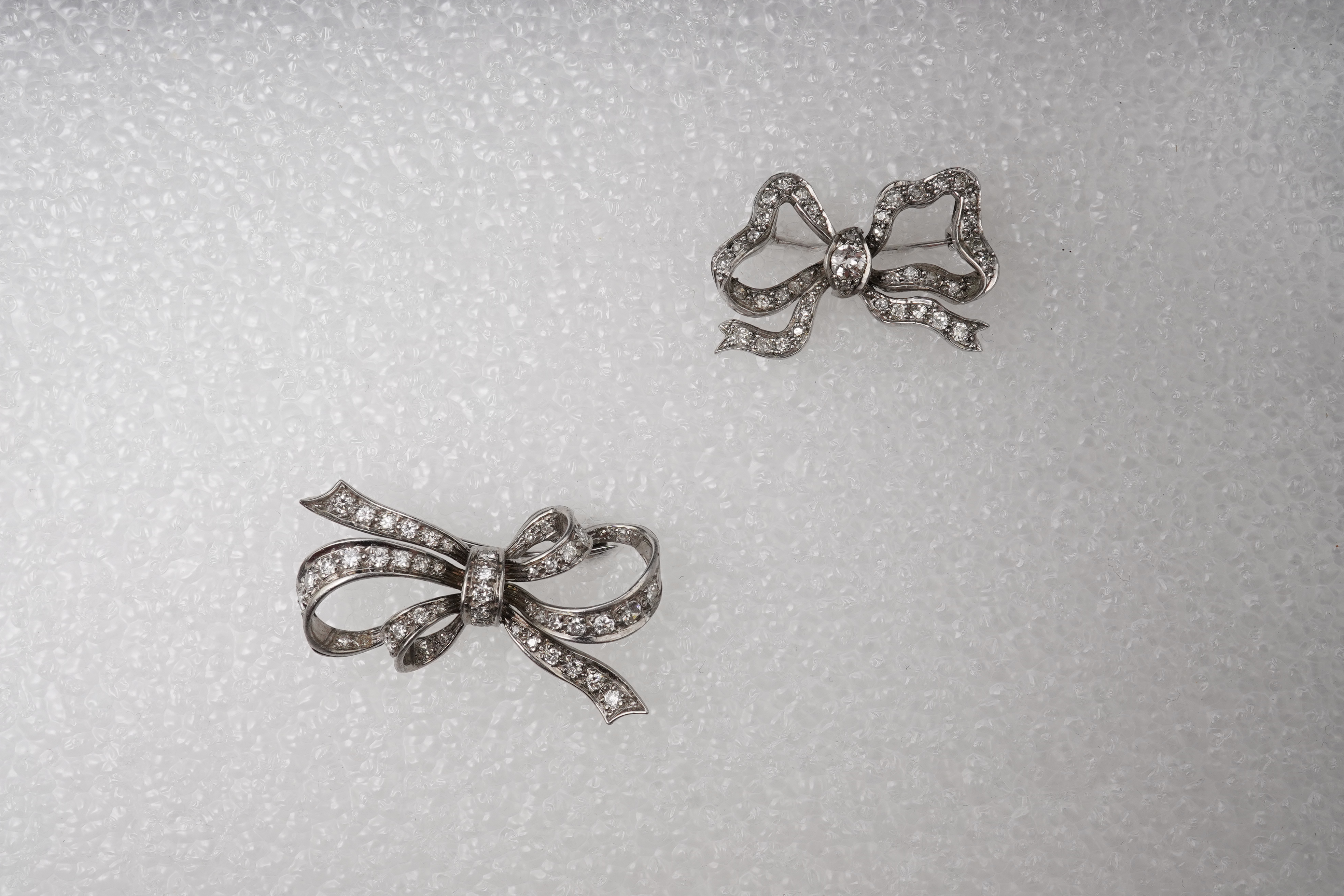 Two diamond brooches, mid 20th century